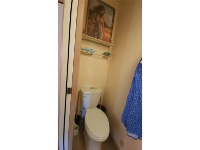 TWO BEDROOM, 1 1/2 BATHROOM MOBILE HOME IN ACTIVE 55+ COMMUNITY on River Run Golf Links in Florida - for sale on GolfHomes.com, golf home, golf lot