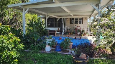 TWO BEDROOM, 1 1/2 BATHROOM MOBILE HOME IN ACTIVE 55+ COMMUNITY on River Run Golf Links in Florida - for sale on GolfHomes.com, golf home, golf lot