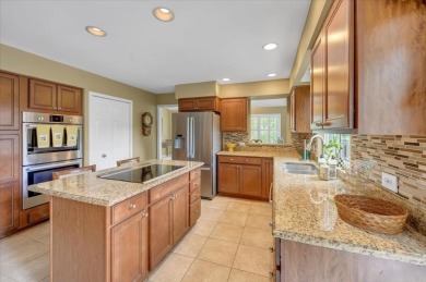 End-Unit Luxury with Golf Views, Abundant Light & Private Gate on Lake Barrington Shores Golf Course in Illinois - for sale on GolfHomes.com, golf home, golf lot