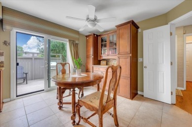 End-Unit Luxury with Golf Views, Abundant Light & Private Gate on Lake Barrington Shores Golf Course in Illinois - for sale on GolfHomes.com, golf home, golf lot