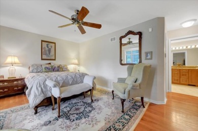 End-Unit Luxury with Golf Views, Abundant Light & Private Gate on Lake Barrington Shores Golf Course in Illinois - for sale on GolfHomes.com, golf home, golf lot
