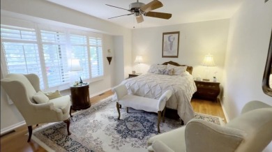 End-Unit Luxury with Golf Views, Abundant Light & Private Gate on Lake Barrington Shores Golf Course in Illinois - for sale on GolfHomes.com, golf home, golf lot