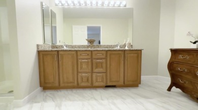 End-Unit Luxury with Golf Views, Abundant Light & Private Gate on Lake Barrington Shores Golf Course in Illinois - for sale on GolfHomes.com, golf home, golf lot