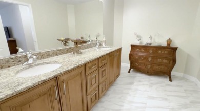 End-Unit Luxury with Golf Views, Abundant Light & Private Gate on Lake Barrington Shores Golf Course in Illinois - for sale on GolfHomes.com, golf home, golf lot