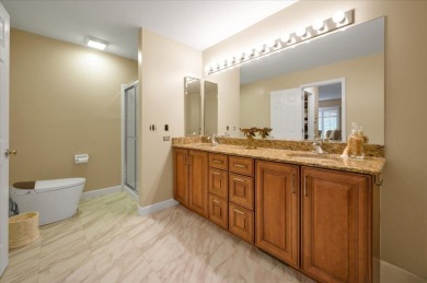 End-Unit Luxury with Golf Views, Abundant Light & Private Gate on Lake Barrington Shores Golf Course in Illinois - for sale on GolfHomes.com, golf home, golf lot