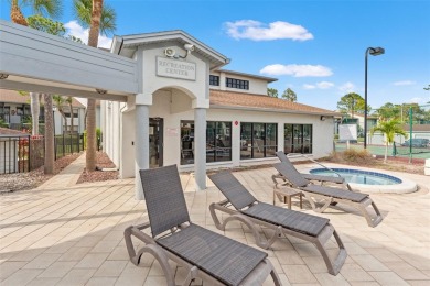 Under contract-accepting backup offers. Welcome to resort-style on Feather Sound Country Club in Florida - for sale on GolfHomes.com, golf home, golf lot