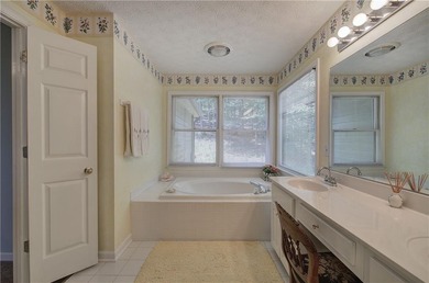 Step into this inviting ranch-style home, filled with natural on Bent Tree Golf Course in Georgia - for sale on GolfHomes.com, golf home, golf lot