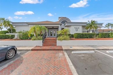 Under contract-accepting backup offers. Welcome to resort-style on Feather Sound Country Club in Florida - for sale on GolfHomes.com, golf home, golf lot