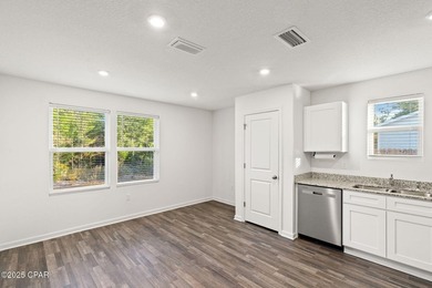 Discover modern Florida living in this move in ready 3-bedroom on Sunny Hills Golf and Country Club in Florida - for sale on GolfHomes.com, golf home, golf lot