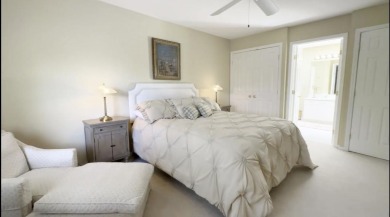 End-Unit Luxury with Golf Views, Abundant Light & Private Gate on Lake Barrington Shores Golf Course in Illinois - for sale on GolfHomes.com, golf home, golf lot
