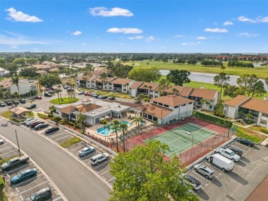 Under contract-accepting backup offers. Welcome to resort-style on Feather Sound Country Club in Florida - for sale on GolfHomes.com, golf home, golf lot