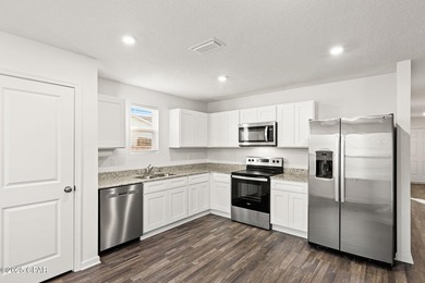 Discover modern Florida living in this move in ready 3-bedroom on Sunny Hills Golf and Country Club in Florida - for sale on GolfHomes.com, golf home, golf lot