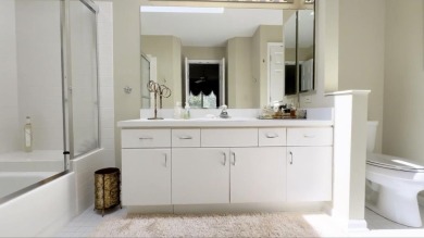 End-Unit Luxury with Golf Views, Abundant Light & Private Gate on Lake Barrington Shores Golf Course in Illinois - for sale on GolfHomes.com, golf home, golf lot