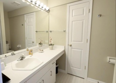 End-Unit Luxury with Golf Views, Abundant Light & Private Gate on Lake Barrington Shores Golf Course in Illinois - for sale on GolfHomes.com, golf home, golf lot