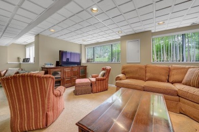 End-Unit Luxury with Golf Views, Abundant Light & Private Gate on Lake Barrington Shores Golf Course in Illinois - for sale on GolfHomes.com, golf home, golf lot