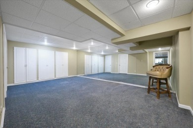 End-Unit Luxury with Golf Views, Abundant Light & Private Gate on Lake Barrington Shores Golf Course in Illinois - for sale on GolfHomes.com, golf home, golf lot