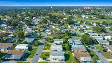 Charming 2-Bedroom, 2-Bath Home with Den, nestled in the on El Diablo Executive Golf Course in Florida - for sale on GolfHomes.com, golf home, golf lot