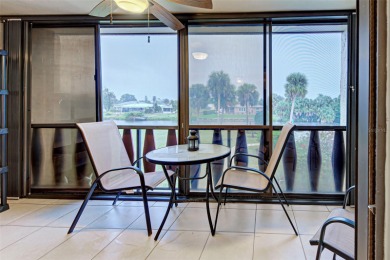 Water view condo on the second floor.  Riverhouse HOA is a on Rotonda Golf and Country Club The Hills Course in Florida - for sale on GolfHomes.com, golf home, golf lot