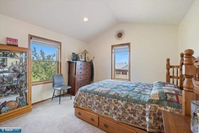 This well-maintained 4-bedroom, 3-bath home, built in 2013 on Virginia Golf Course in Minnesota - for sale on GolfHomes.com, golf home, golf lot