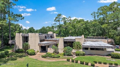 Tucked at the end of a quiet cul-de-sac in Deerwood on The Deerwood Country Club in Florida - for sale on GolfHomes.com, golf home, golf lot