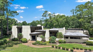 Tucked at the end of a quiet cul-de-sac in Deerwood on The Deerwood Country Club in Florida - for sale on GolfHomes.com, golf home, golf lot