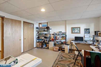This well-maintained 4-bedroom, 3-bath home, built in 2013 on Virginia Golf Course in Minnesota - for sale on GolfHomes.com, golf home, golf lot