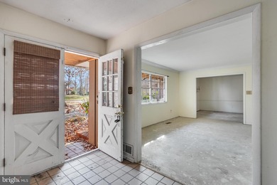 Welcome to this expansive 4-bedroom, 2.5-bath rambler nestled in on National Golf Club At Tantallon in Maryland - for sale on GolfHomes.com, golf home, golf lot