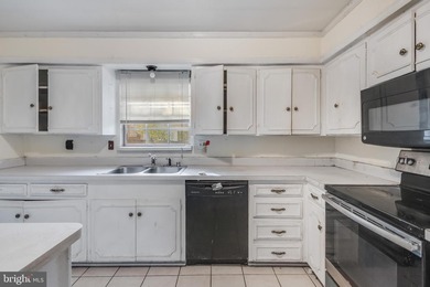 Welcome to this expansive 4-bedroom, 2.5-bath rambler nestled in on National Golf Club At Tantallon in Maryland - for sale on GolfHomes.com, golf home, golf lot