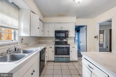 Welcome to this expansive 4-bedroom, 2.5-bath rambler nestled in on National Golf Club At Tantallon in Maryland - for sale on GolfHomes.com, golf home, golf lot