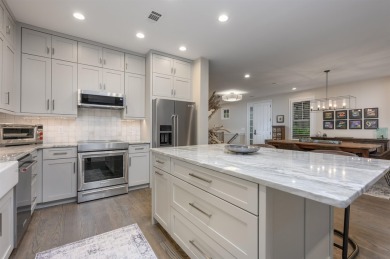Impeccably renovated townhome in the heart of Reynolds Lake on Reynolds Lake Oconee - The Oconee in Georgia - for sale on GolfHomes.com, golf home, golf lot
