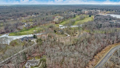 Lake Tansi Golf front acreage! 2.6 Acres. Level land, wooded on Lake Tansi Village Country Club in Tennessee - for sale on GolfHomes.com, golf home, golf lot