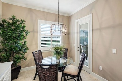 Enjoy stunning Naples sunsets from your private lanai in this on The Golf Lodge At the Quarry in Florida - for sale on GolfHomes.com, golf home, golf lot