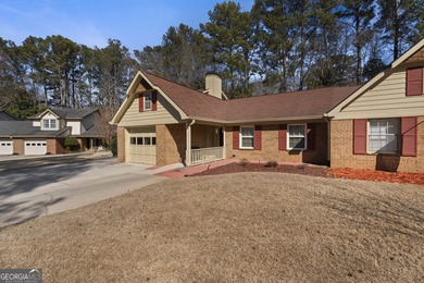 Ideally located in the heart of Peachtree City, this inviting on Canongate At Flat Creek Club in Georgia - for sale on GolfHomes.com, golf home, golf lot