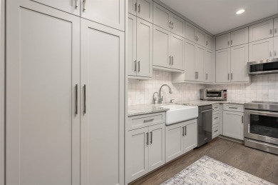 Impeccably renovated townhome in the heart of Reynolds Lake on Reynolds Lake Oconee - The Oconee in Georgia - for sale on GolfHomes.com, golf home, golf lot