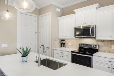 Enjoy stunning Naples sunsets from your private lanai in this on The Golf Lodge At the Quarry in Florida - for sale on GolfHomes.com, golf home, golf lot