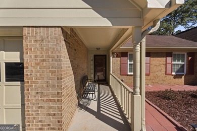 Ideally located in the heart of Peachtree City, this inviting on Canongate At Flat Creek Club in Georgia - for sale on GolfHomes.com, golf home, golf lot