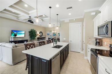 Enjoy stunning Naples sunsets from your private lanai in this on The Golf Lodge At the Quarry in Florida - for sale on GolfHomes.com, golf home, golf lot