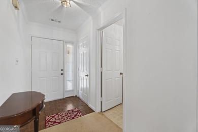 Ideally located in the heart of Peachtree City, this inviting on Canongate At Flat Creek Club in Georgia - for sale on GolfHomes.com, golf home, golf lot