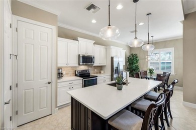 Enjoy stunning Naples sunsets from your private lanai in this on The Golf Lodge At the Quarry in Florida - for sale on GolfHomes.com, golf home, golf lot