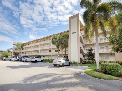 This fully renovated unit has captivating water vistas from its on Wynmoor Golf Course in Florida - for sale on GolfHomes.com, golf home, golf lot