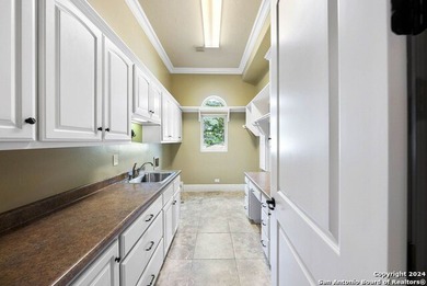 Elegantly situated on the 18th hole of Comanche Trace's on The Club At Comanche Trace in Texas - for sale on GolfHomes.com, golf home, golf lot