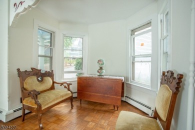 Step into the timeless charm of this Victorian gem in the heart on Mt Tabor Country Club in New Jersey - for sale on GolfHomes.com, golf home, golf lot