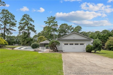 Live the dream in this stunning home on the golf course just on Cypress Lakes Golf Course in North Carolina - for sale on GolfHomes.com, golf home, golf lot