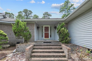 Live the dream in this stunning home on the golf course just on Cypress Lakes Golf Course in North Carolina - for sale on GolfHomes.com, golf home, golf lot