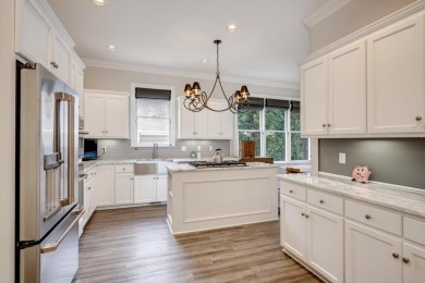 Nestled privately on coveted Charles Towne Place - a quiet on Woodside Plantation Country Club in South Carolina - for sale on GolfHomes.com, golf home, golf lot