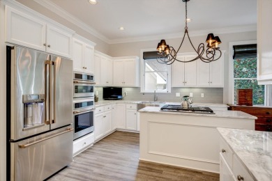 Nestled privately on coveted Charles Towne Place - a quiet on Woodside Plantation Country Club in South Carolina - for sale on GolfHomes.com, golf home, golf lot
