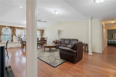 Live the dream in this stunning home on the golf course just on Cypress Lakes Golf Course in North Carolina - for sale on GolfHomes.com, golf home, golf lot