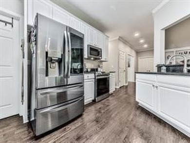 Welcome to this beautifully updated home in the sought-after on Canongate At Eagle Watch Golf Club in Georgia - for sale on GolfHomes.com, golf home, golf lot