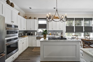 Nestled privately on coveted Charles Towne Place - a quiet on Woodside Plantation Country Club in South Carolina - for sale on GolfHomes.com, golf home, golf lot