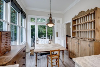 Nestled privately on coveted Charles Towne Place - a quiet on Woodside Plantation Country Club in South Carolina - for sale on GolfHomes.com, golf home, golf lot